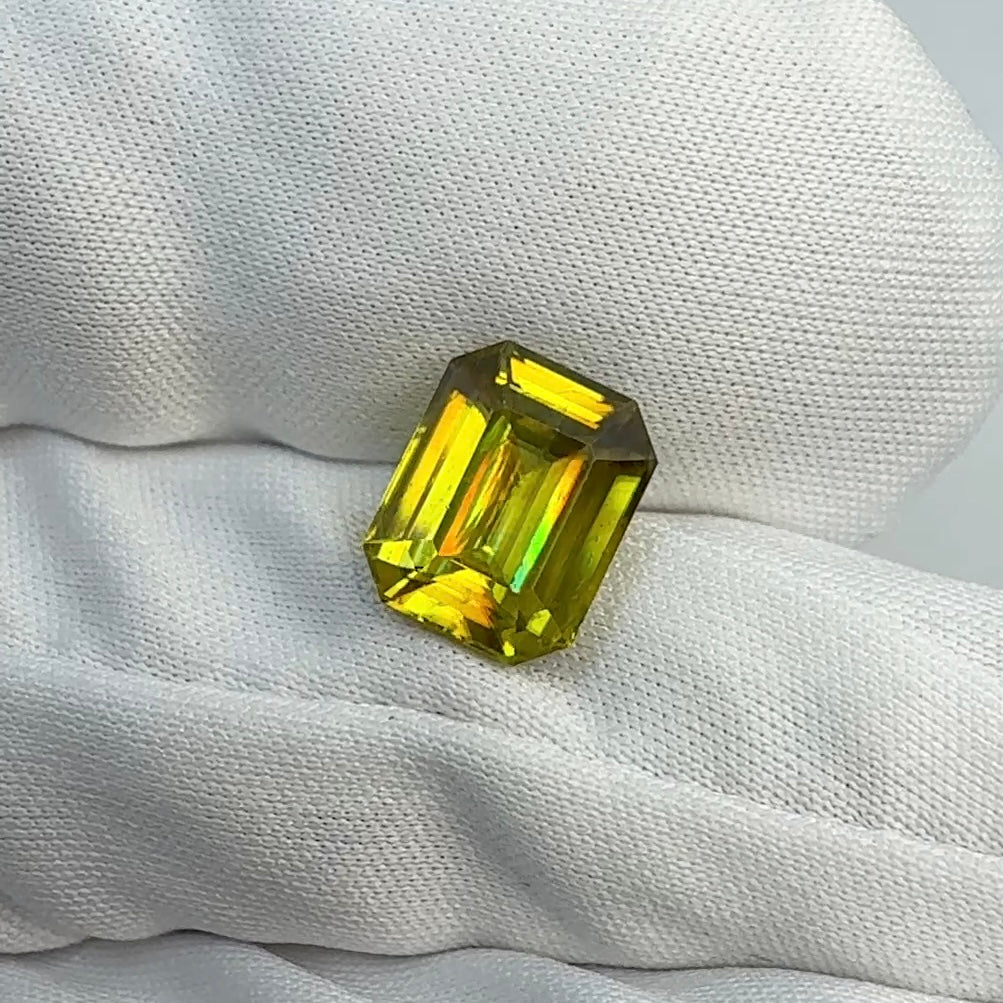 3.19 carat sphene emerald cut madagascar AIG certificate report
