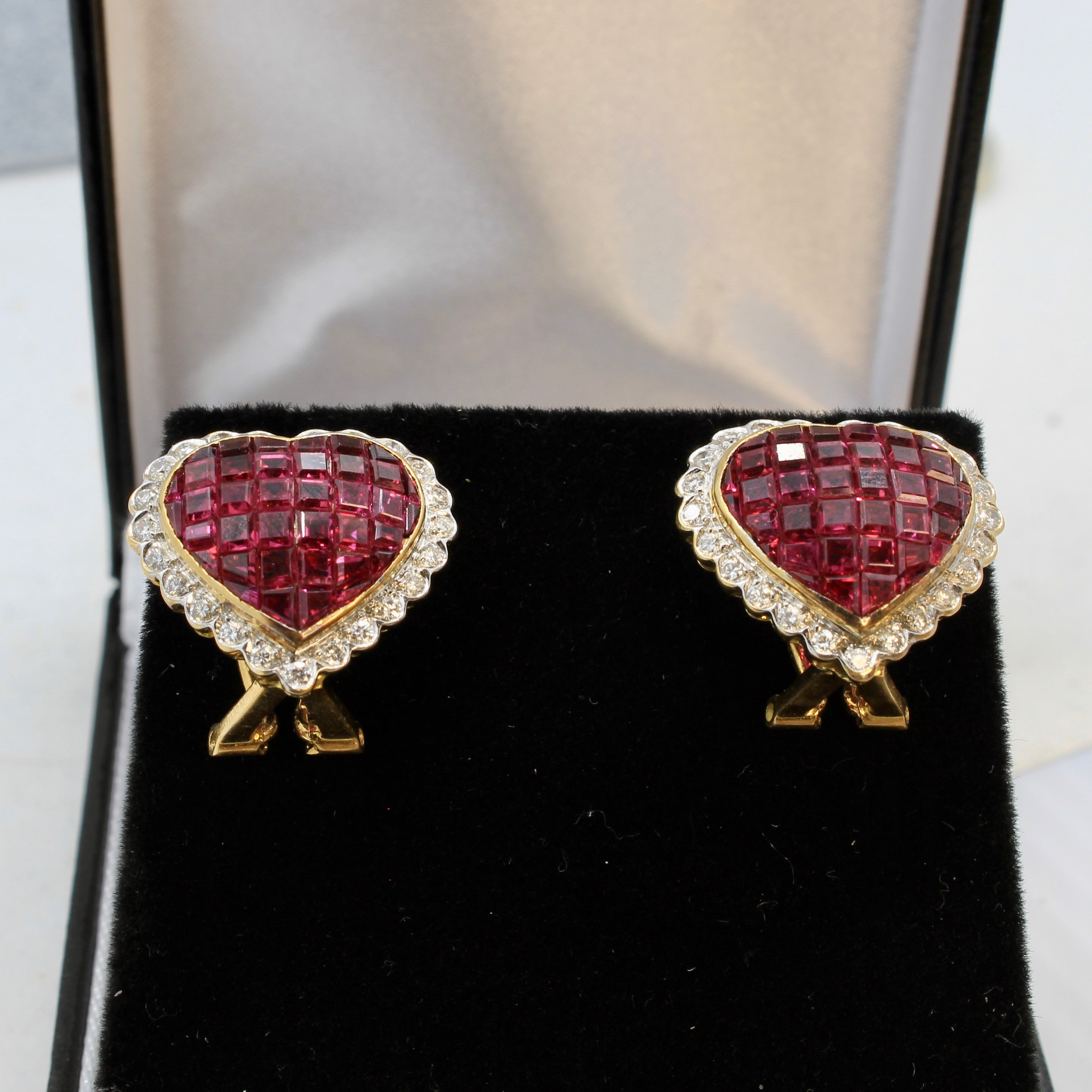 front view of mystery set ruby and diamond Heart Stud / Clip on Earrings 18k yellow gold