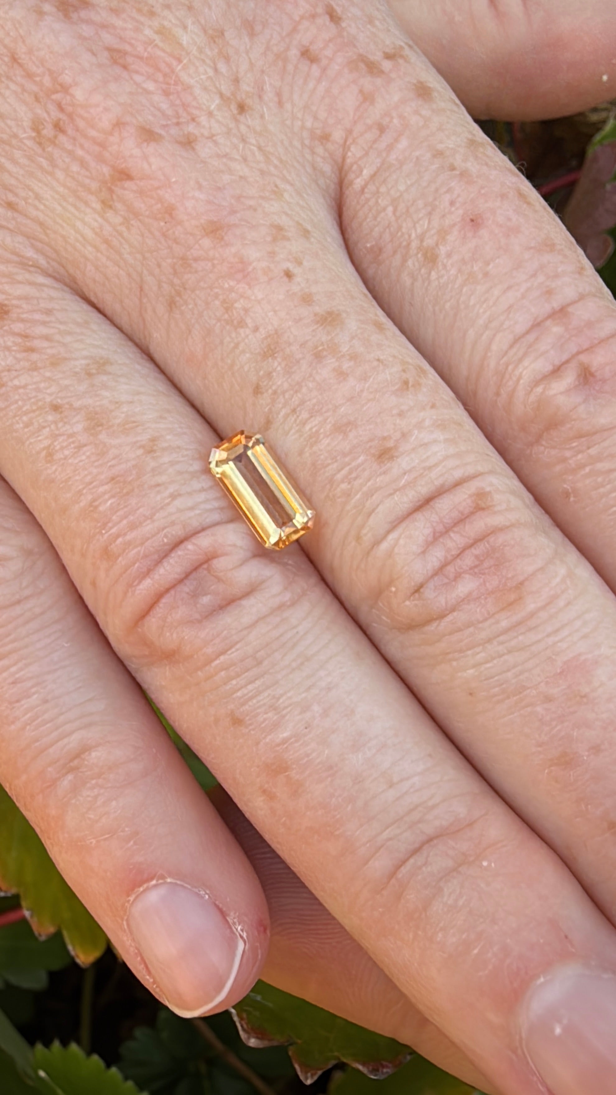 Orange imperial topaz emerald cut