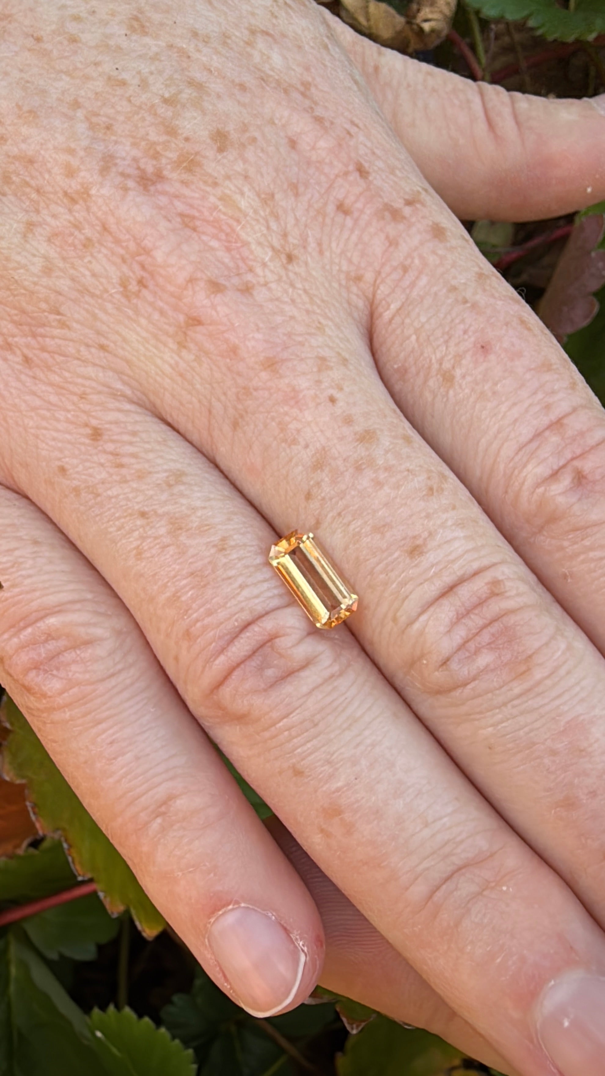 Orange imperial topaz emerald cut