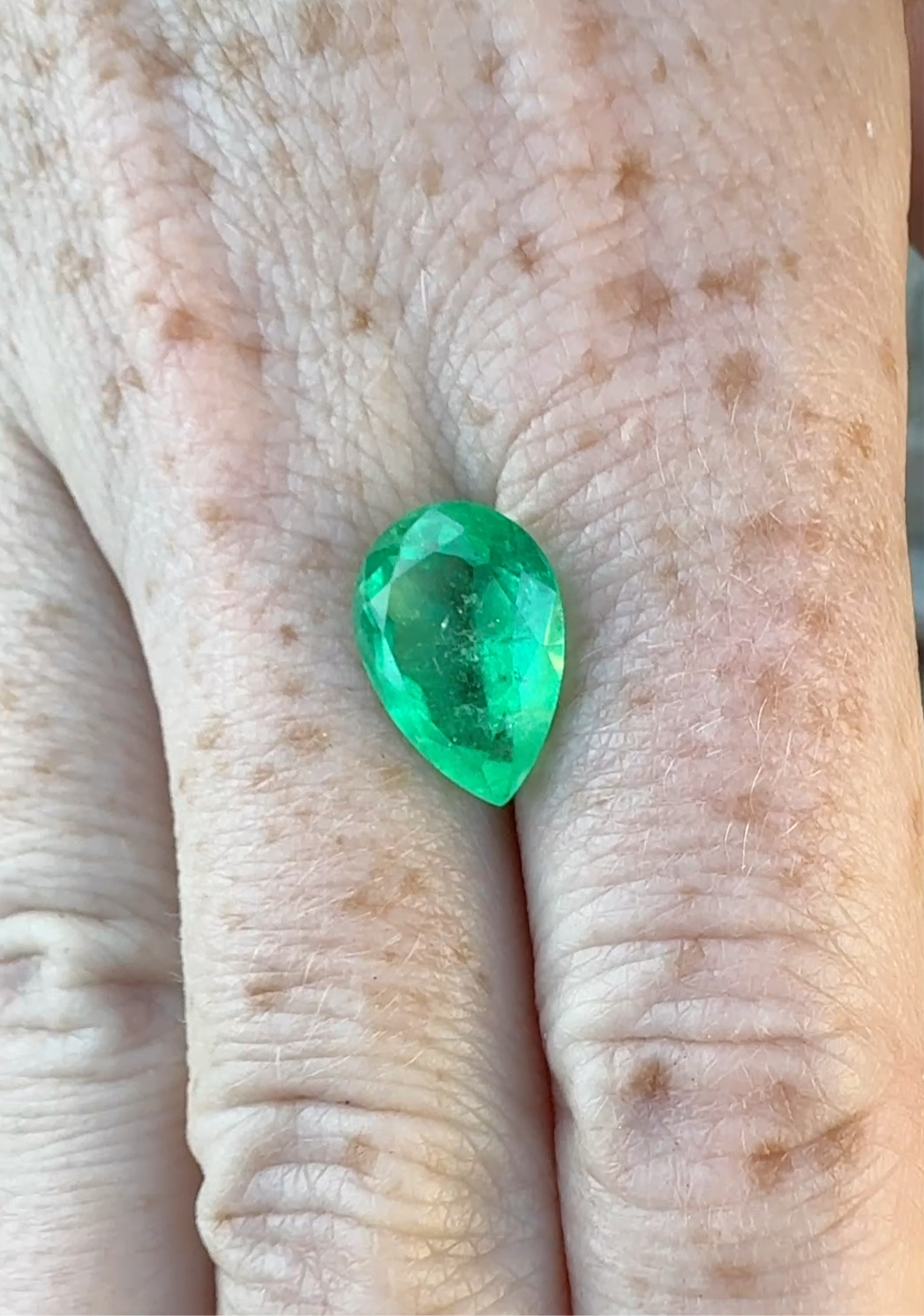 Columbian emerald GIA pear green F2 moderate oil