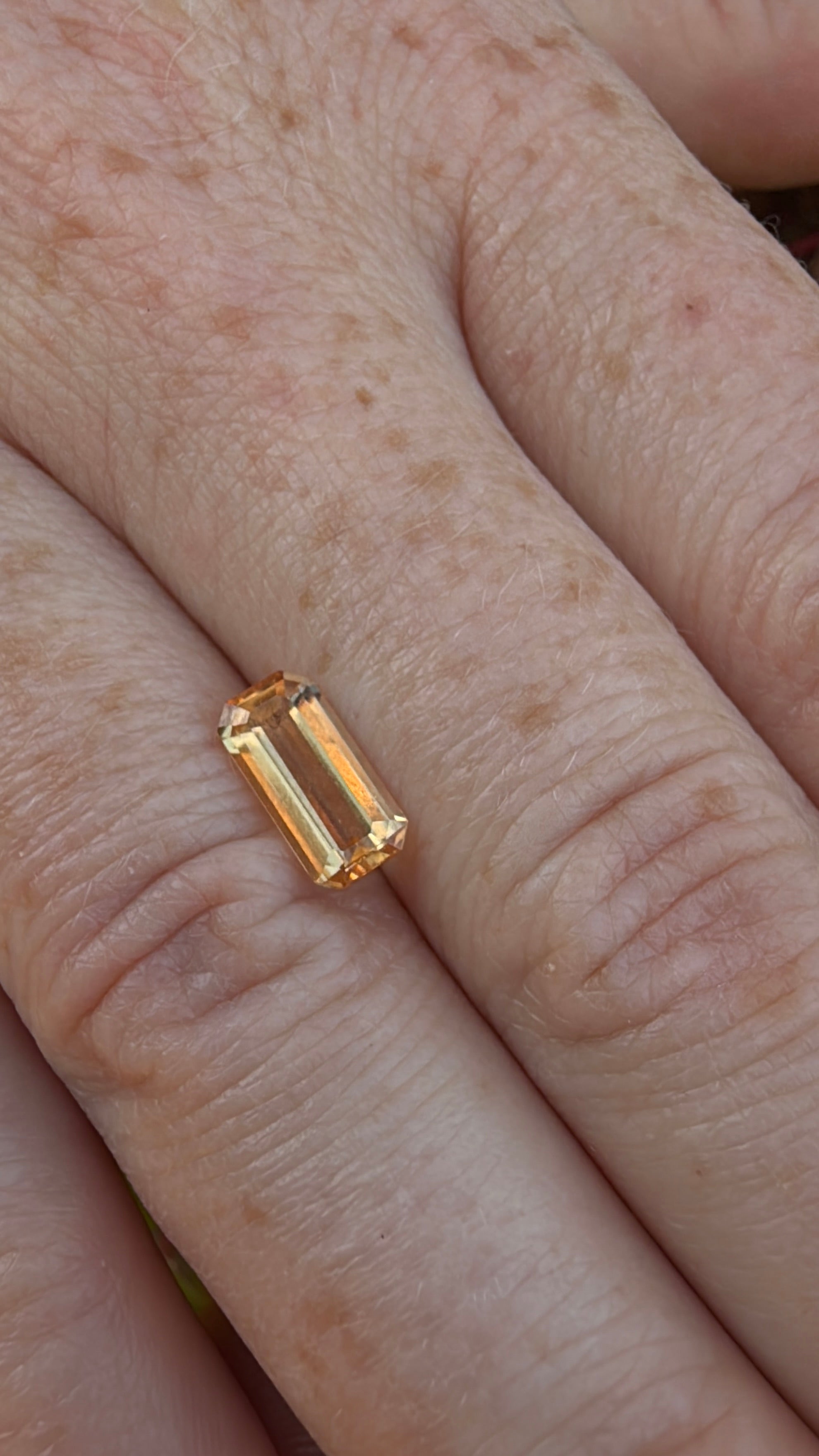 Orange imperial topaz emerald cut