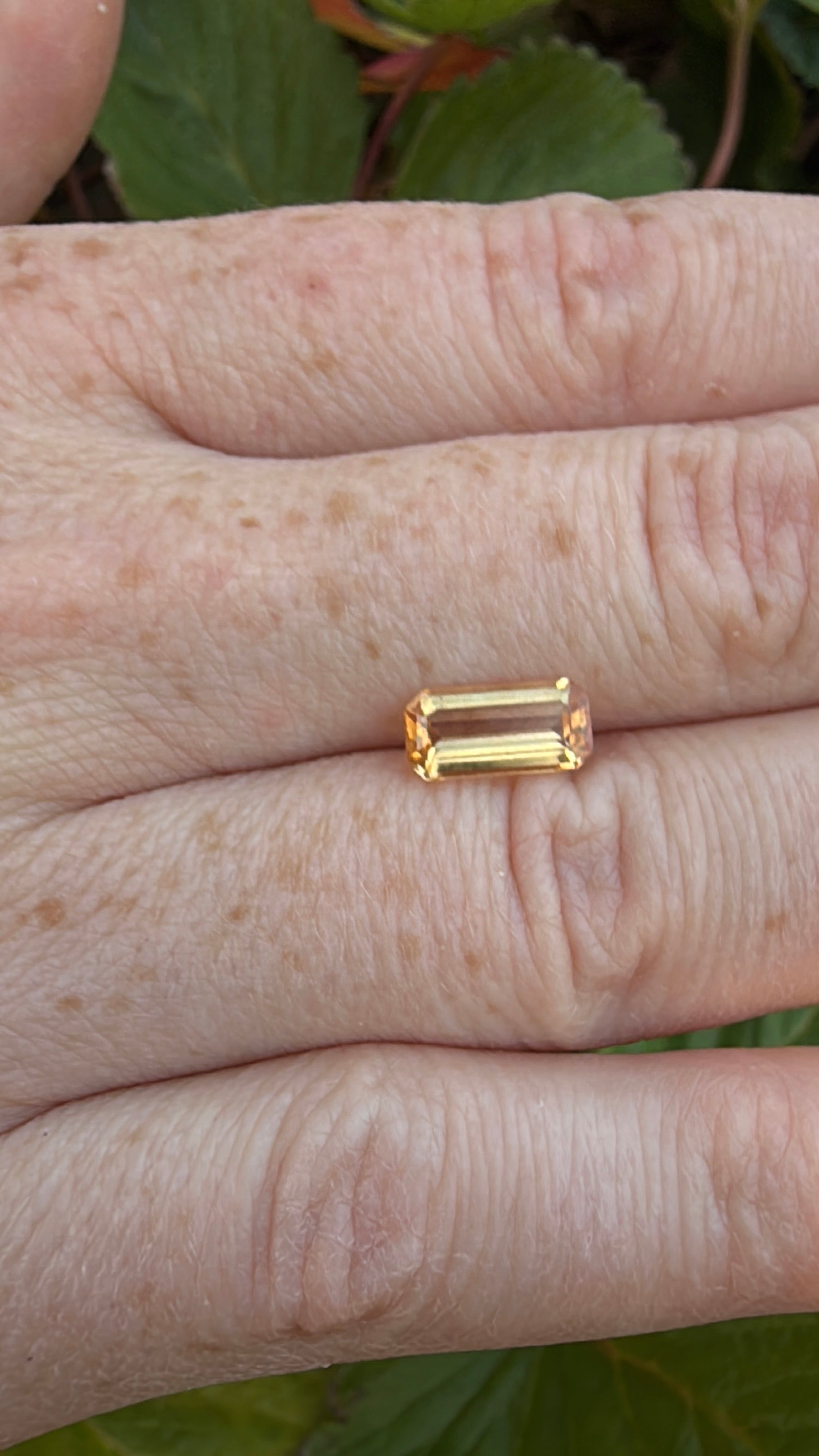 Orange imperial topaz emerald cut
