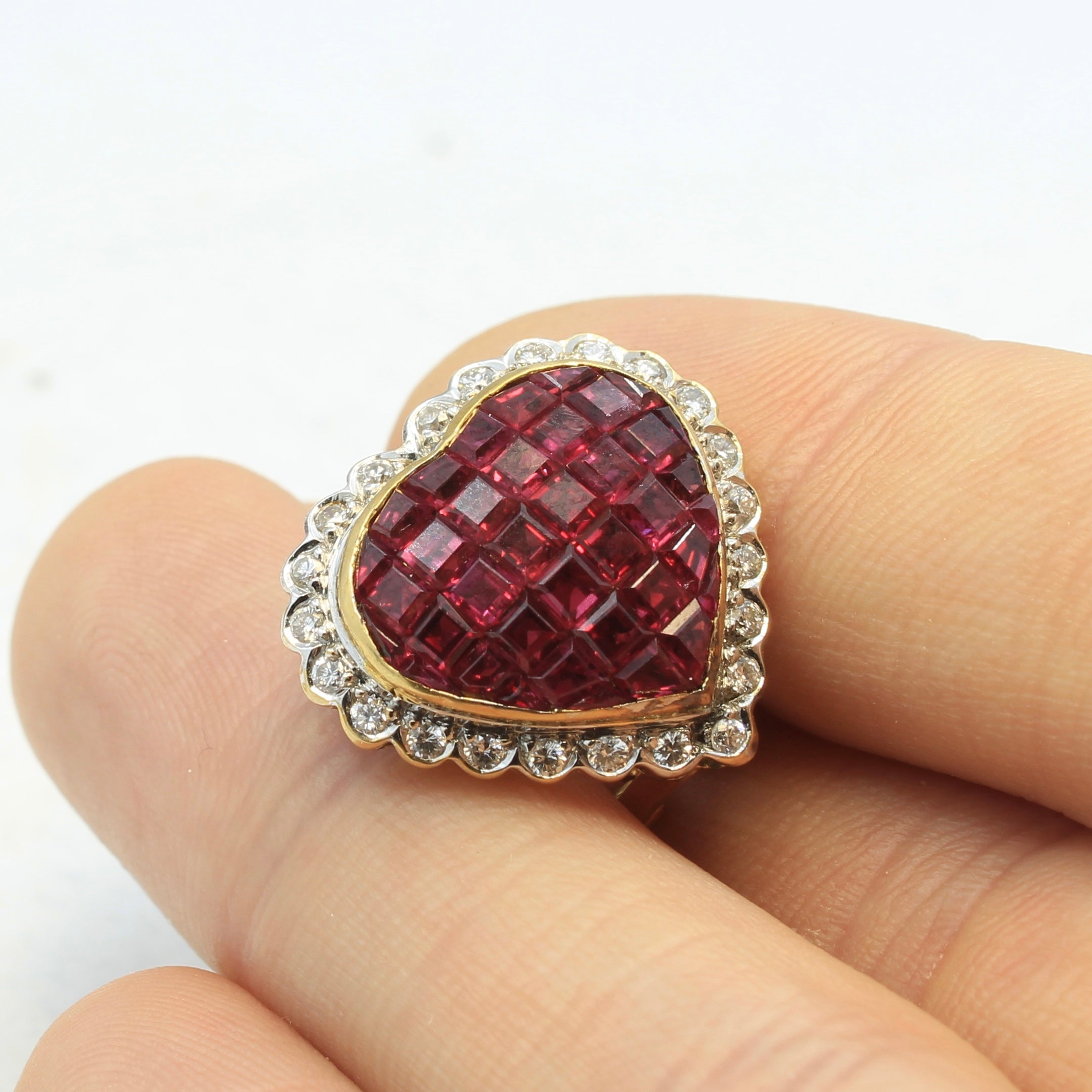front view of mystery set ruby and diamond Heart Stud / Clip on Earrings 18k yellow gold