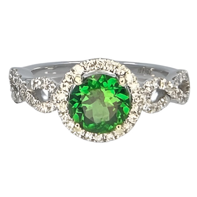 Round Tsavorite Garnet in a twisted white gold setting with pave diamonds.