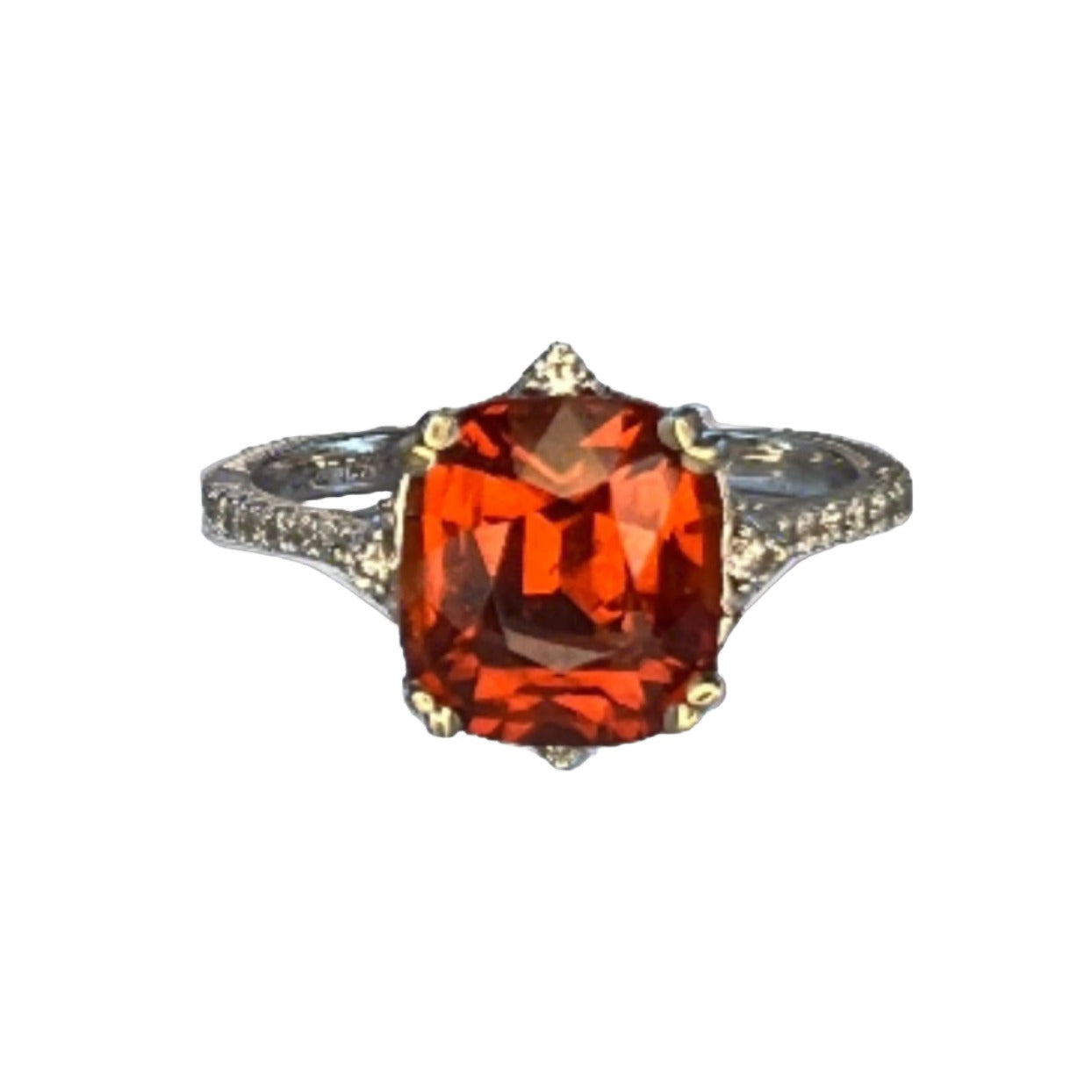 orange Spessartine garnet ring set in 14k white gold with diamond accents.
