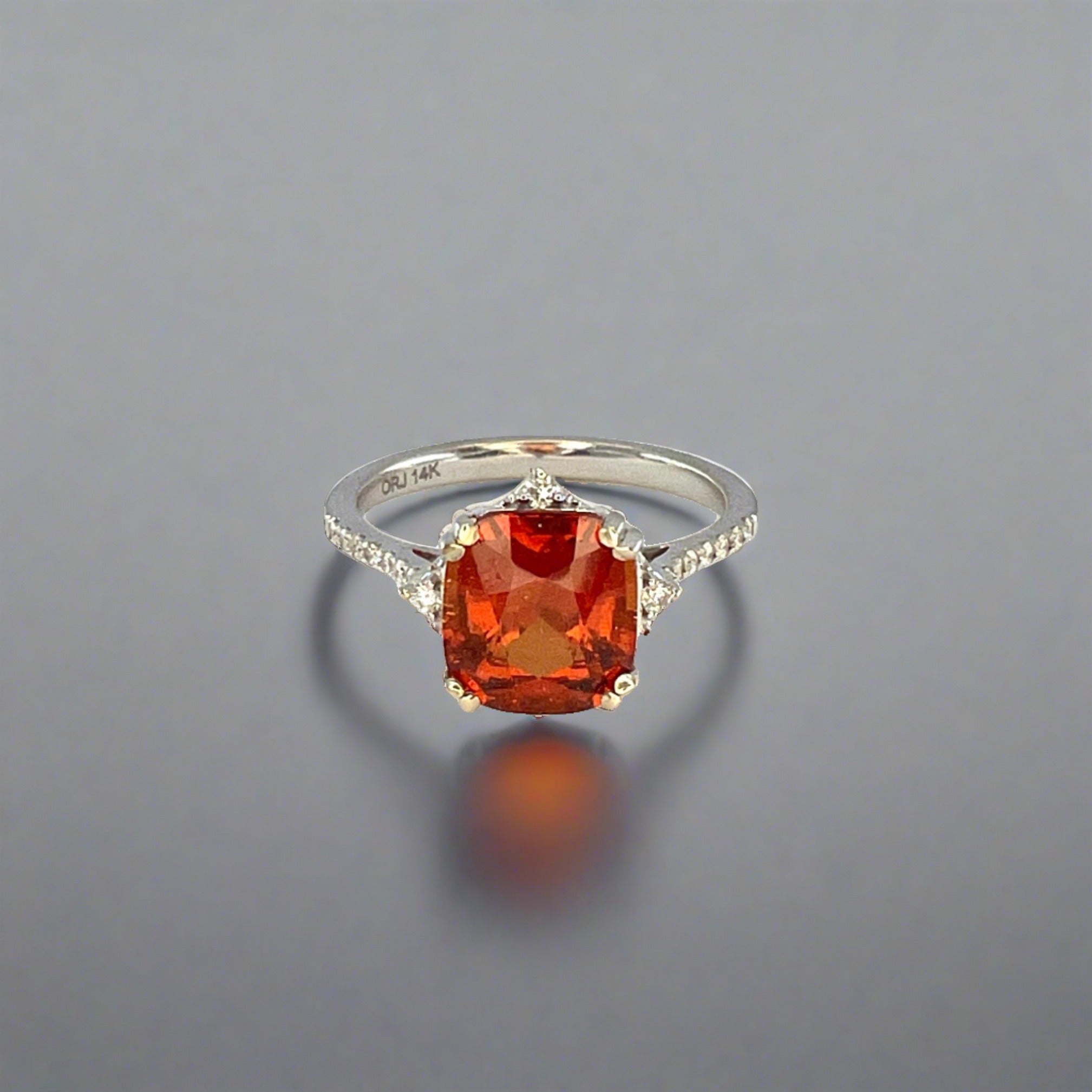 Burnt Orange Cushion Spessartine Garnet in a white gold ring