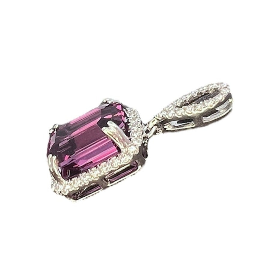 The side view of these exceptional mahenge garnet drop earrings