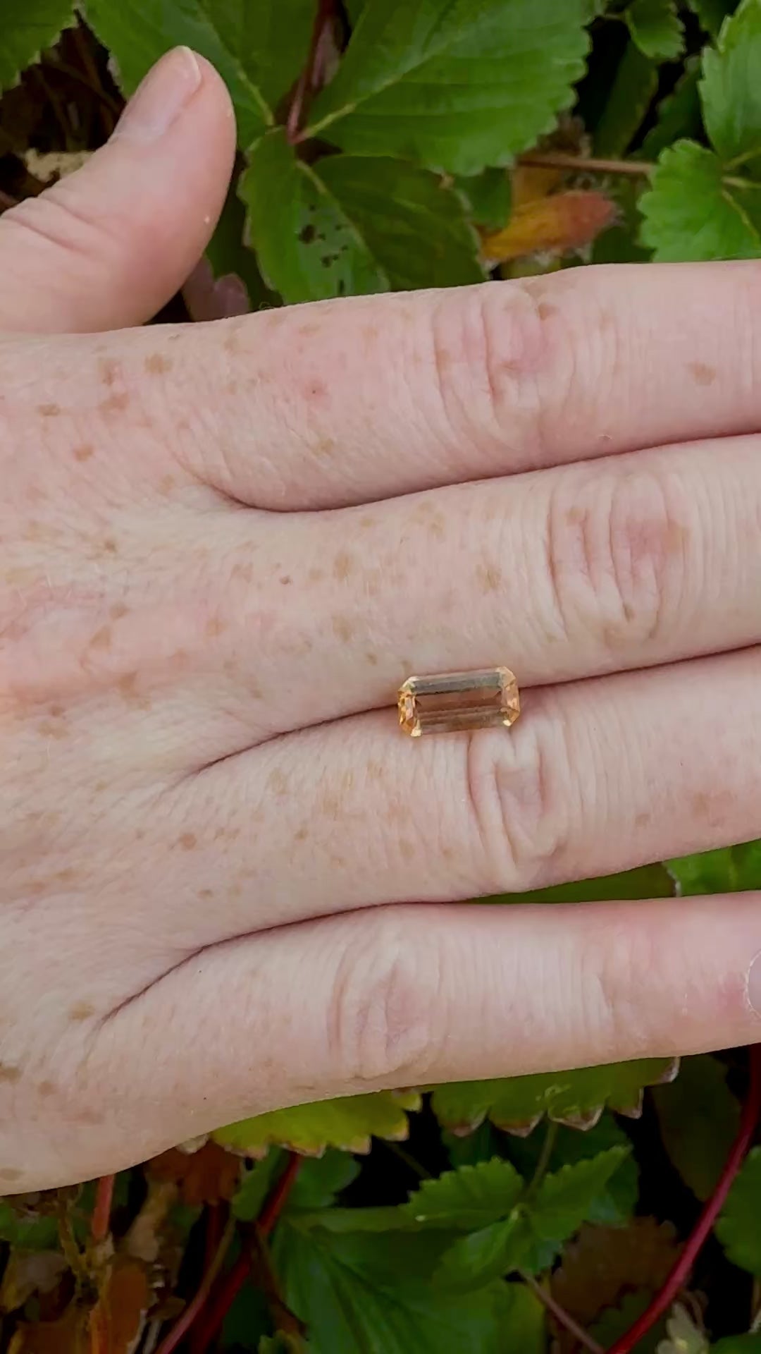 Orange imperial topaz emerald cut