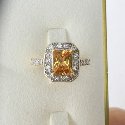 imperial topaz diamond and gold ring low lighting