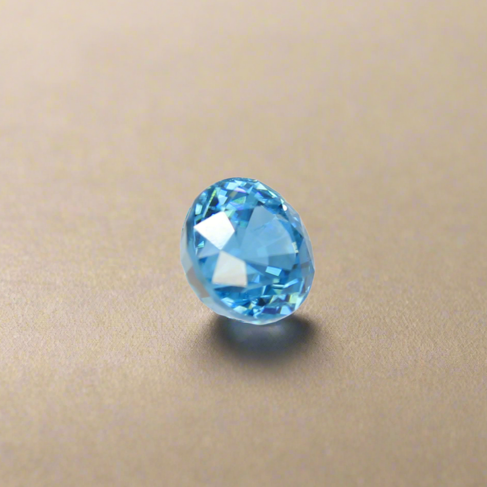 Round blue zircon from the side 3.47Ct