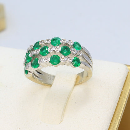 emerald and diamond 18k white gold ring round