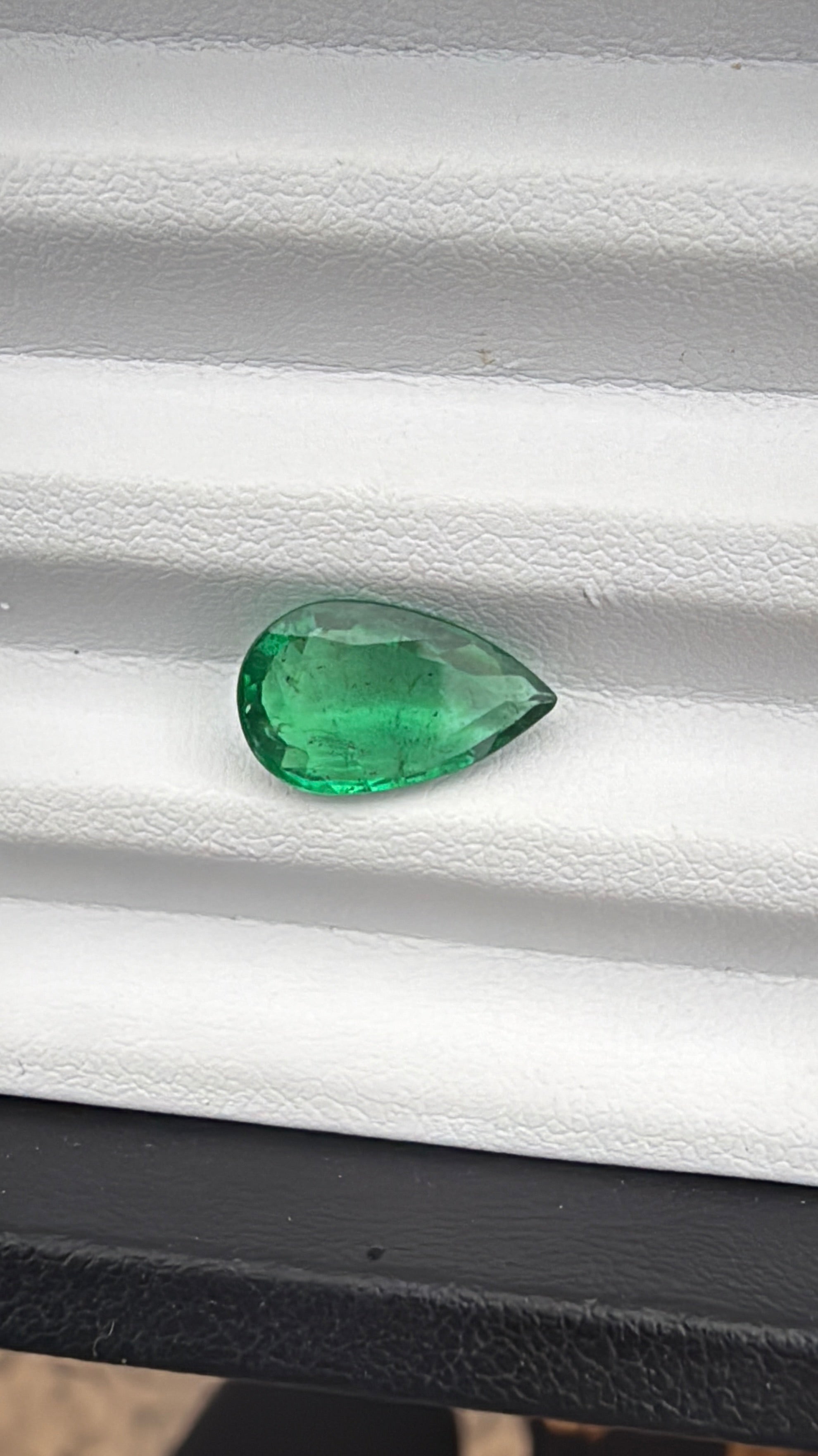 AGL certified pear shaped emerald step cut