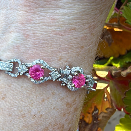 Pink spinel bracelet link white gold diamonds on wrist natural light