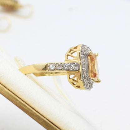 imperial topaz diamond and gold ring side profile orange