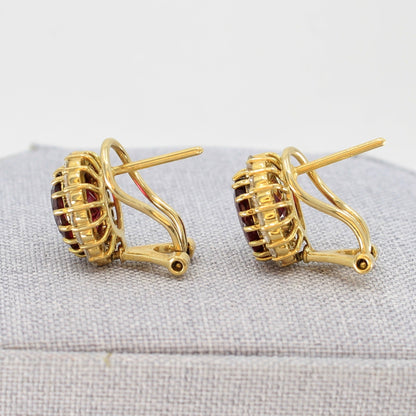 side view of deep red rubellite earrings in 14K Yellow Gold with posts and omega clips