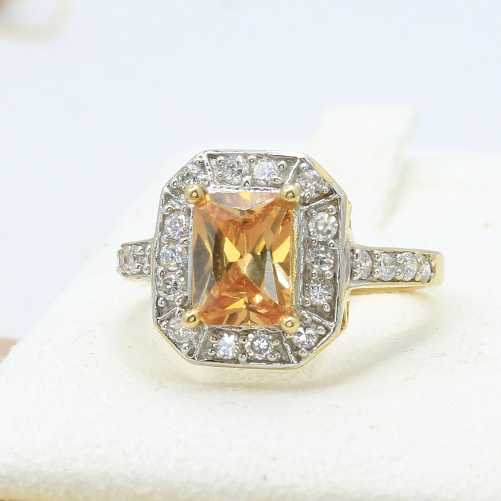 imperial topaz diamond and gold ring radiant cut orange color