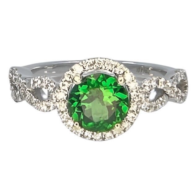 Round Tsavorite Garnet in a twisted white gold setting with pave diamonds. 