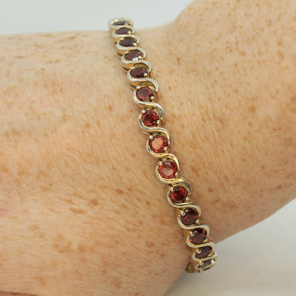 Red garnet tennis bracelet in silver and 7 inches long