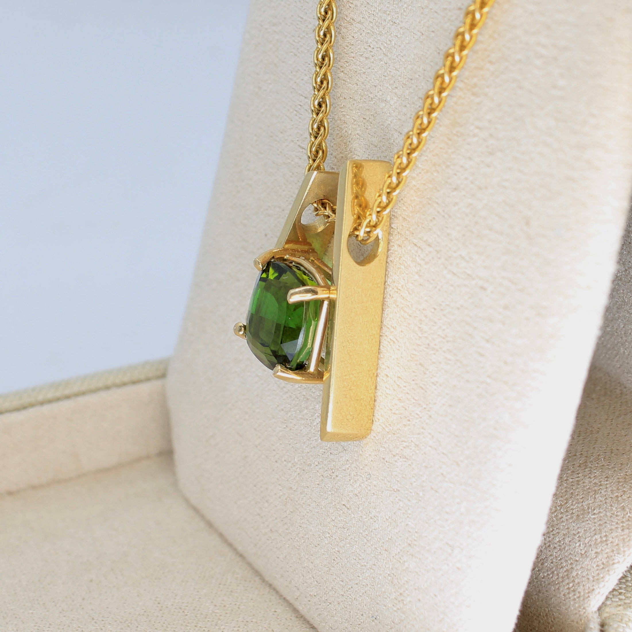 Green tourmaline asymmetrical pendant in 14k yellow gold