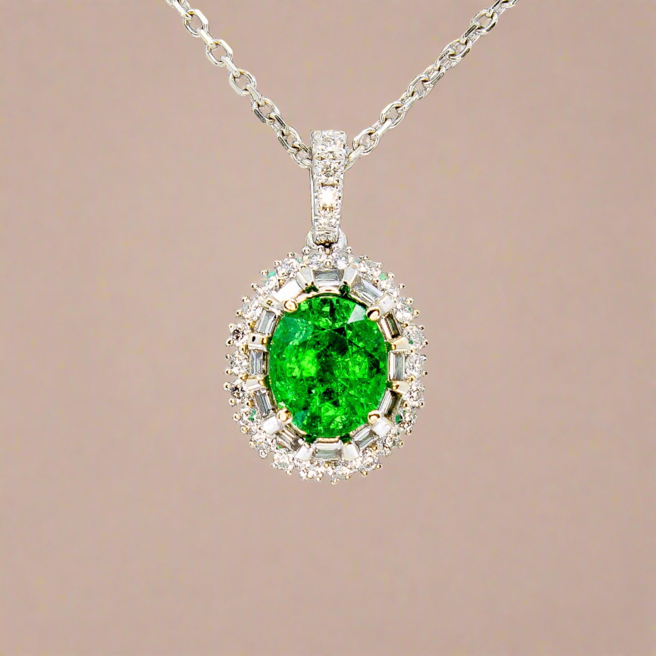 Tsavorite garnet pedant in 18k white gold with a diamond accent and double halo