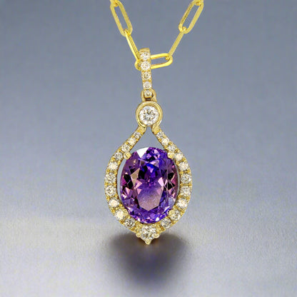 Aroura Tanzanite Pendant, showing lilac and purple colors with a hint of red