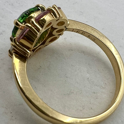 Side view of the chrome tourmaline ring that shows the 1.68 and K18 hallmarks