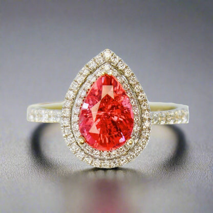 Mahenge Red Spinel pear shape engagement ring in 18K white gold with a double halo.