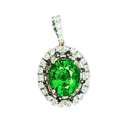 Tsavorite Garnet Pendant in a double diamond halo, the first halo has baguette cut diamonds and the second has round diamonds