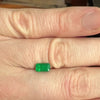 emerald from brazil on hand step cut deep green