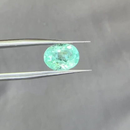 Video of the paraiba tourmaline rotated to show imperfections