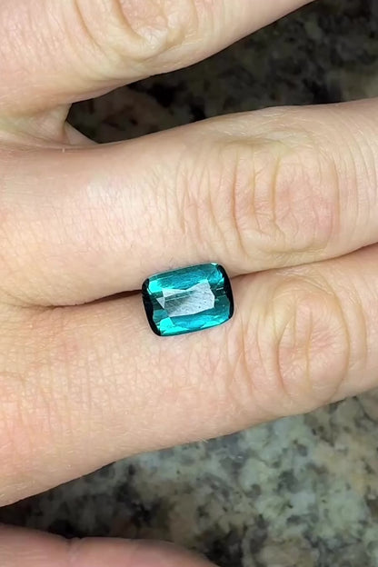 teal blue indicolite tourmaline cushion video on hand