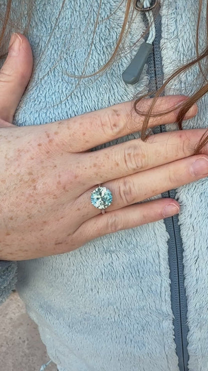 Video of Blue zircon ring white gold round 8 ct cocktail ring natural on hand outside