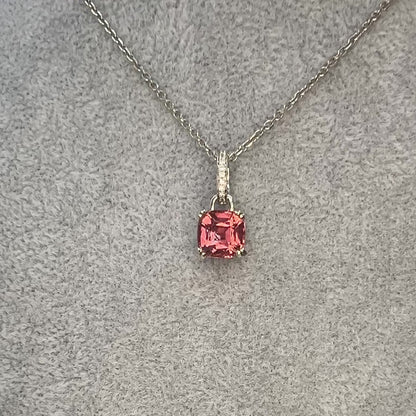 A video of the pink tourmaline pendant being moved from left to right