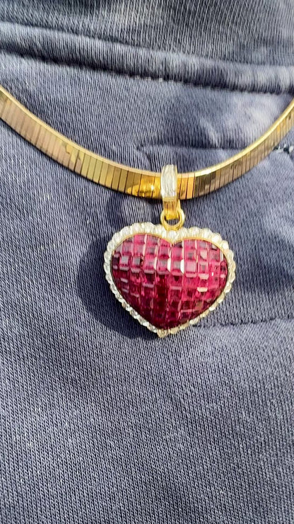 invisible set ruby heart pendant with a latching clasp and diamond accent.