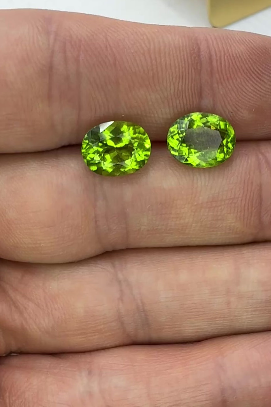 Peridot oval video pair lime green on hand